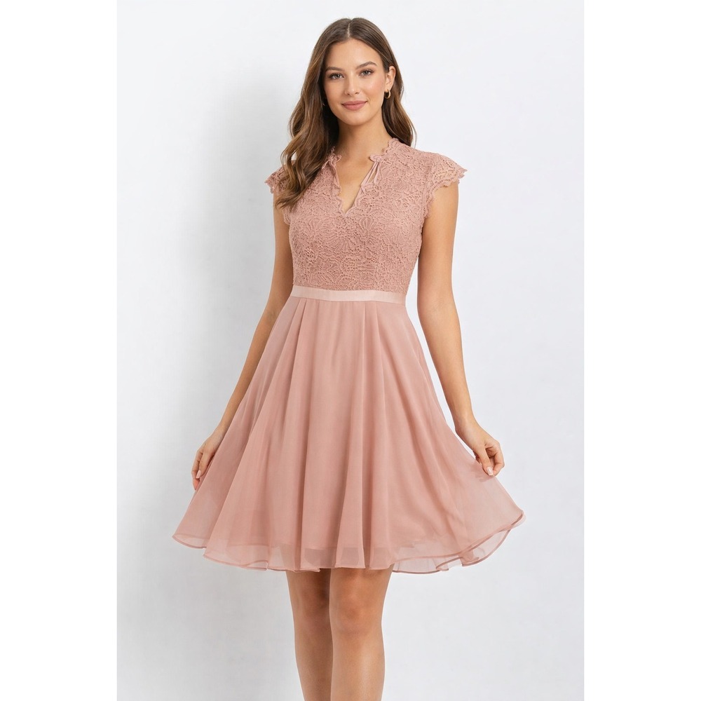 Dress Size XXL. features a V-neckline and sleeveless design , NEW WITH TAGS.